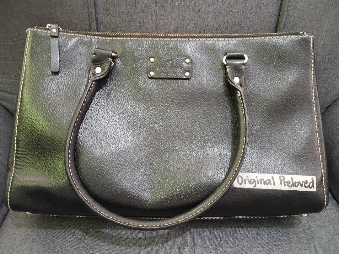 Kate Spade Black Leather Tote Bag (Category: Tote Bags) located in Binangonan. Submitted by chingtp (Listing ID 1459097231, Image 1). Description: - Genuine black leather Kate Spade tote bag (15"×9") - Classic design with elegant white stitching Flaws: -please see #9-#10 photos -needs interior cleaning .