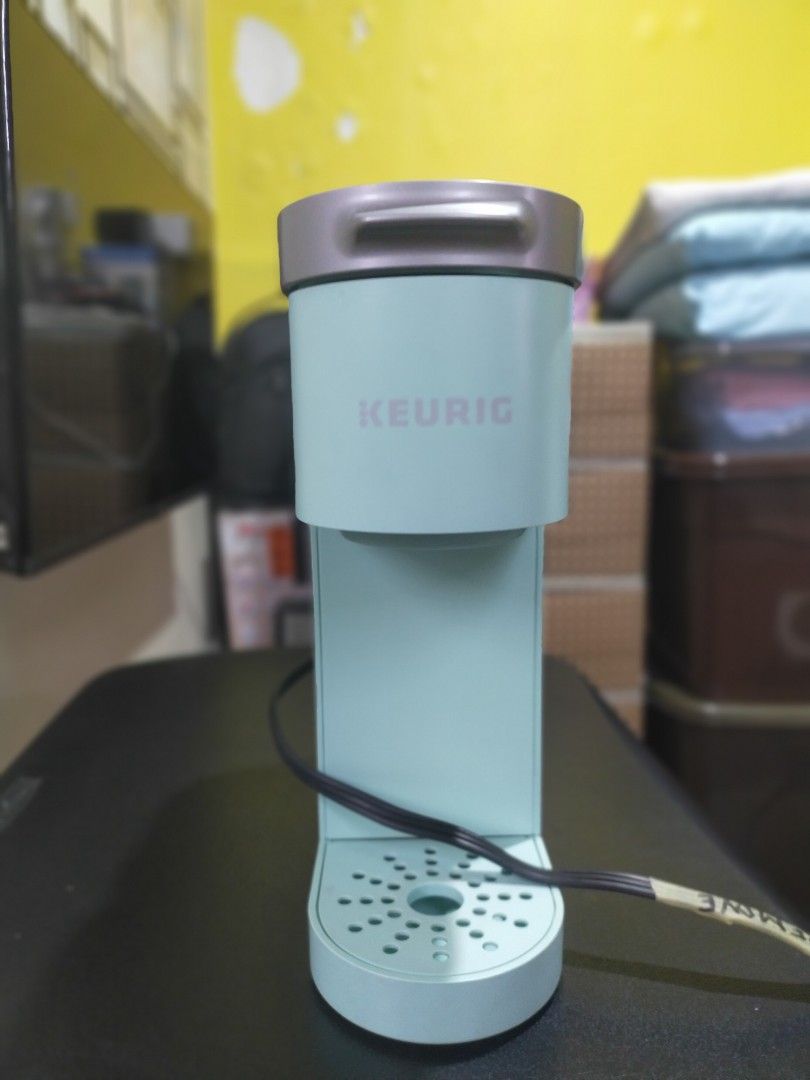 KEURIG MINI K Coffee Maker (Category: Coffee & Tea Tableware) located in Quezon City. Submitted by leejong720610 (Listing ID 1459187527, Image 1). Description: slightly used one served coffee uses110 transformer in very good condition mint green color from Canada.