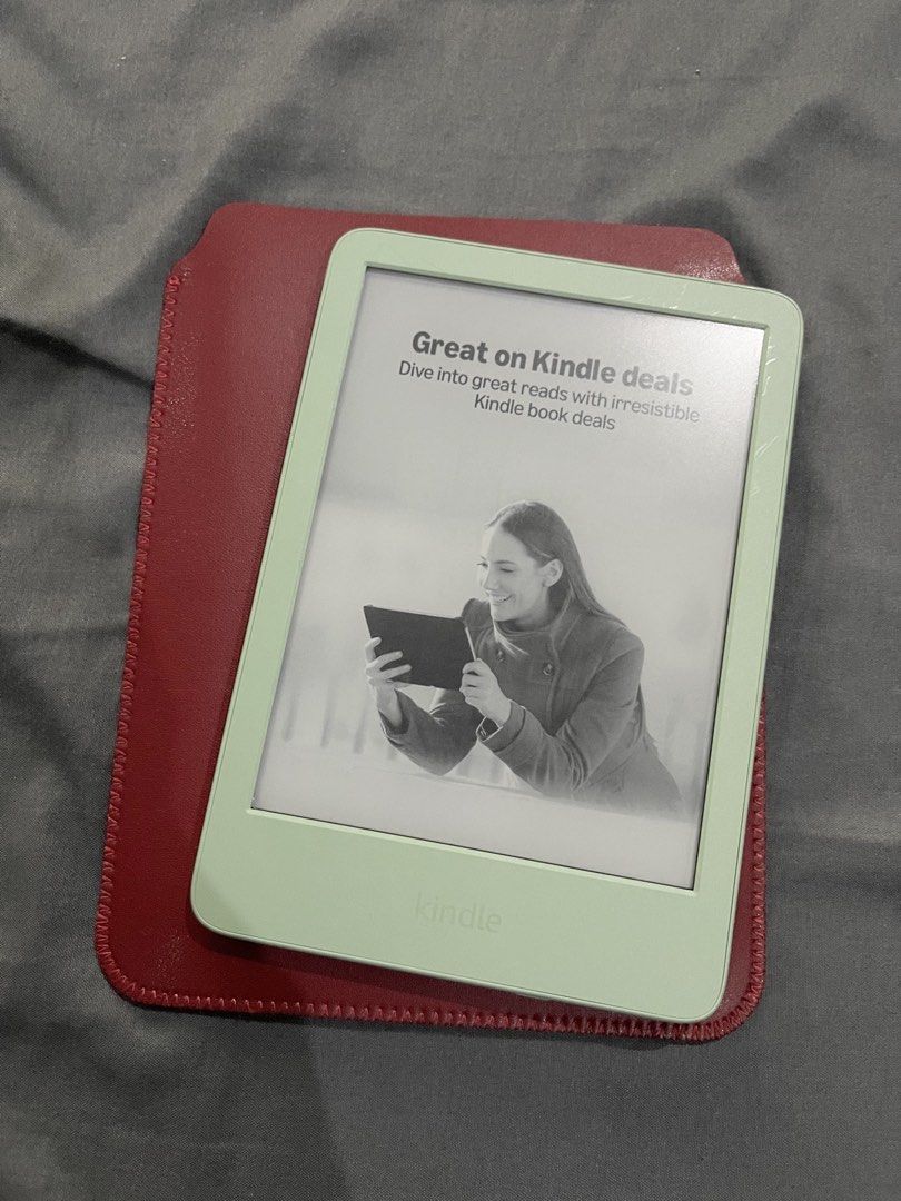 Kindle Basic E-reader (Category: E-Readers) located in Muntinlupa City. Submitted by klumsyunikorn (Listing ID 1459167195, Image 1). Description: Kindle Basic - Matcha GOOD AS NEW!!! Bought July 2026 Complete with Box With Ads: When I got it wala pong ads but it was connected to Amazon Japan which is the default for Asian countries. When I requested customer service to change to Amazon US nagkaroon na po ng ads. Free: leather sleeve, extra screen