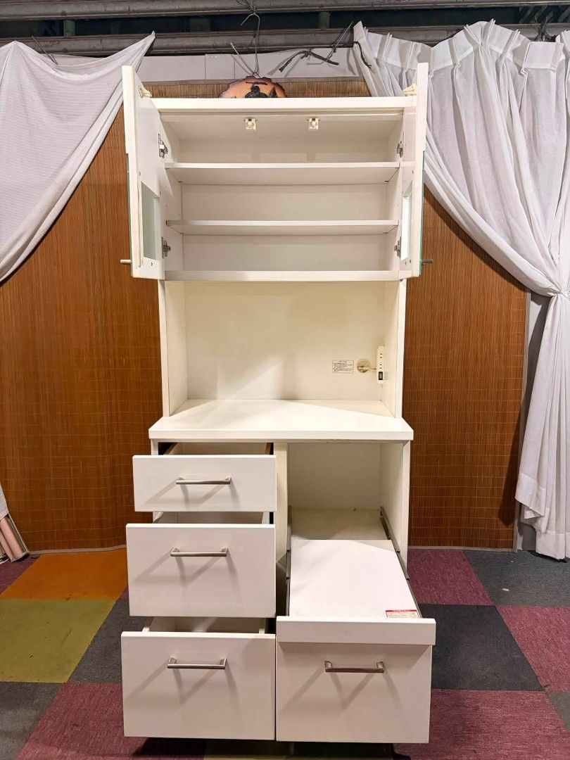 Kitchen Cabinet (Category: Shelves, Cabinets & Racks) located in Meycauayan. Submitted by marygracecasimiro (Listing ID 1459164560, Image 2). Description: 😍NEW ARRIVAL!!! September 2, 2026 Modern Kitchen Organizer Cabinet Duco Finish, Glass Top Cabinet, Adjustable Shelves Big Drawers, Pullout Tray for Rice Cooker Power Extension Outlets 220volts Ready Price : 12,900 ✅ 32L x 20W x 71H inches In VERY good condition ♥️.