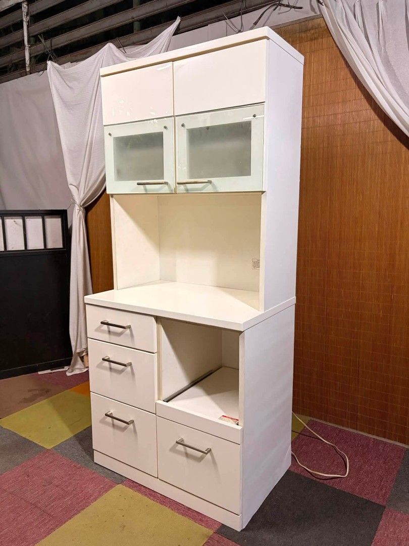 Kitchen Cabinet (Category: Shelves, Cabinets & Racks) located in Meycauayan. Submitted by marygracecasimiro (Listing ID 1459164560, Image 3). Description: 😍NEW ARRIVAL!!! September 2, 2026 Modern Kitchen Organizer Cabinet Duco Finish, Glass Top Cabinet, Adjustable Shelves Big Drawers, Pullout Tray for Rice Cooker Power Extension Outlets 220volts Ready Price : 12,900 ✅ 32L x 20W x 71H inches In VERY good condition ♥️.