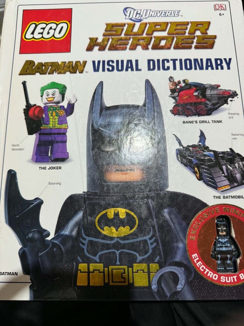 LEGO DC Super Heroes Batman Visual Dictionary Exclusive Minifigure (Category: Lego & Building Sets) located in Davao. Submitted by reyramsir35126 (Listing ID 1459126370, Image 1). Description: - LEGO DC Super Heroes Batman Visual Dictionary - Includes exclusive Electro Suit Batman minifigure - Features Bane's Drill Tank and the Batmobile - Great for Batman and LEGO enthusiasts - Note: Some wear on cover corners.