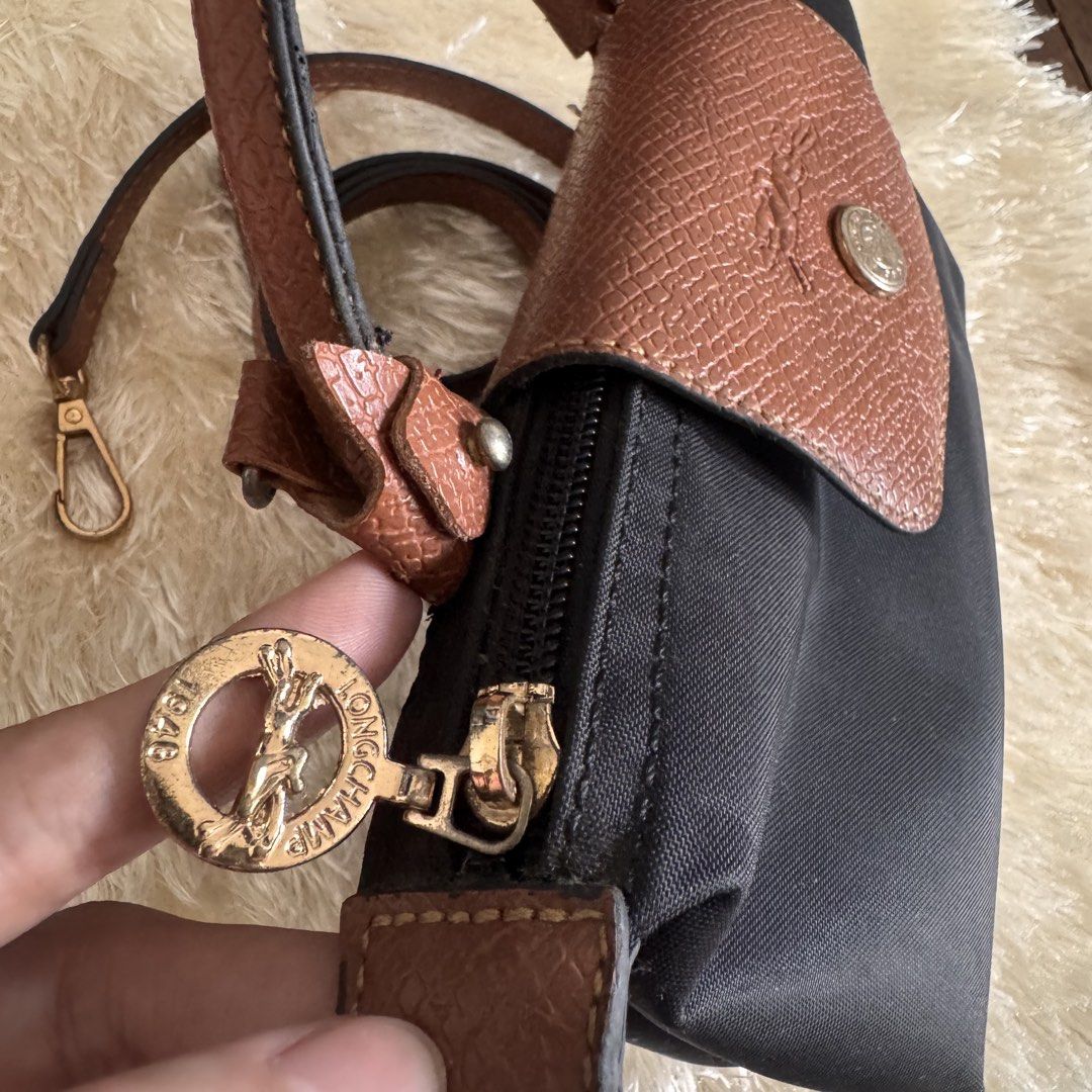 Longchamp micro mini body/sling bag (Category: Shoulder Bags) located in Manila. Submitted by shophistikadabymariel (Listing ID 1459100806, Image 2). Description: Longchamp Micro mini (copy quality) Super cute nito💓 Decluttering.