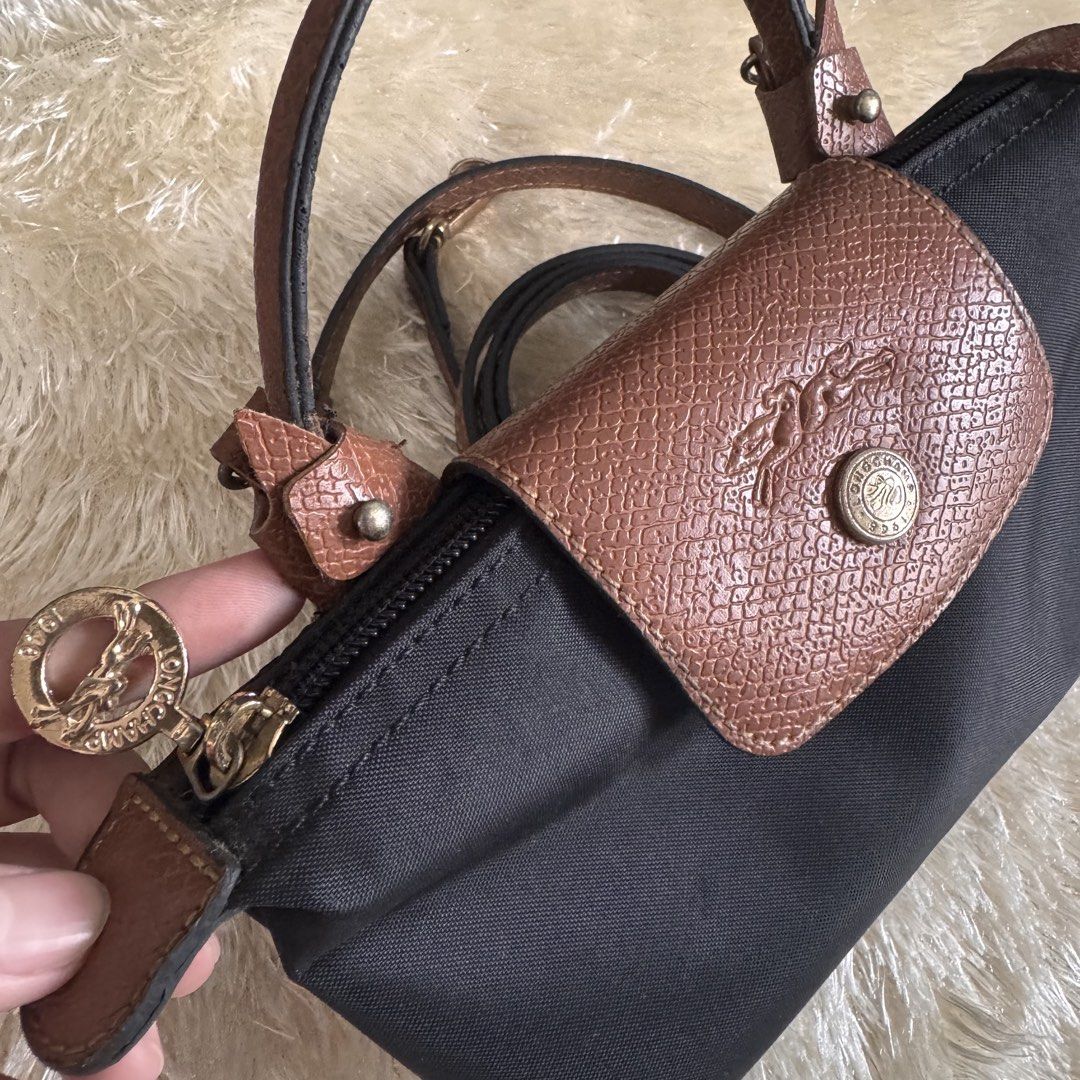 Longchamp micro mini body/sling bag (Category: Shoulder Bags) located in Manila. Submitted by shophistikadabymariel (Listing ID 1459100806, Image 3). Description: Longchamp Micro mini (copy quality) Super cute nito💓 Decluttering.