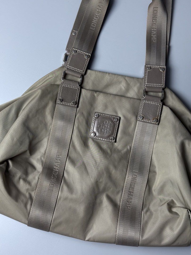 Longchamp Mini Travel Bag (Category: Beach Bags) located in San Pablo. Submitted by zzz.archvs (Listing ID 1459089503, Image 2). Description: Still in excellent condition Minimal discoloration but unnoticeable Zippers are still working good Measurements on pictures .