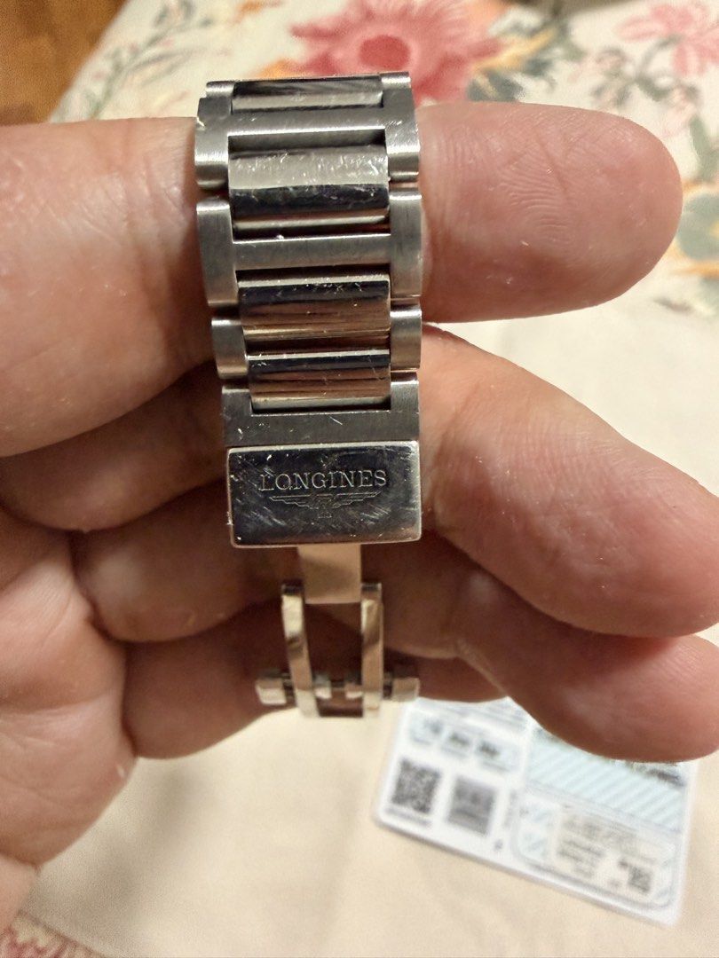 Longines Conquest Automatic Stainless Steel Watch (Category: Luxury Watches) located in Makati City. Submitted by jmvm88 (Listing ID 1459113624, Image 3). Description: - Longines Conquest Automatic Watch, 34MM - Stainless Steel Case and Bracelet - Sunray Dial with Date Window - Minor Scratches on Bracelet and Clasp (Selling As Is) - Includes Warranty Card (Dated November 16, 2024) - With Receipt.