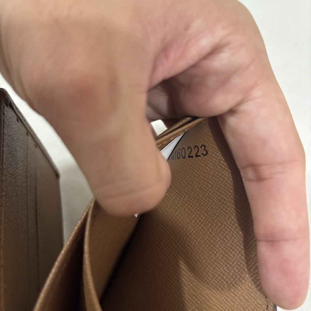 Louis Vuitton Monogram Bifold Wallet (Category: Luxury Bags & Wallets) located in Cavite. Submitted by itsayaaa (Listing ID 1459047918, Image 3). Description: - Classic Louis Vuitton bifold wallet - Iconic monogram canvas - Multiple card slots - Bill compartment - Ideal for everyday use - A timeless accessory.