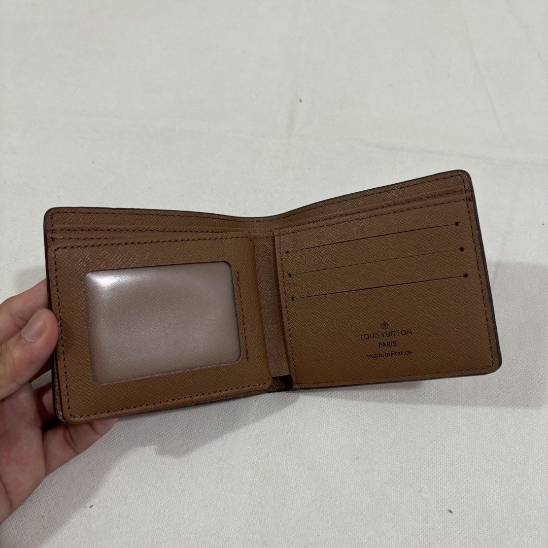 Louis Vuitton Monogram Bifold Wallet (Category: Luxury Bags & Wallets) located in Cavite. Submitted by itsayaaa (Listing ID 1459047918, Image 2). Description: - Classic Louis Vuitton bifold wallet - Iconic monogram canvas - Multiple card slots - Bill compartment - Ideal for everyday use - A timeless accessory.