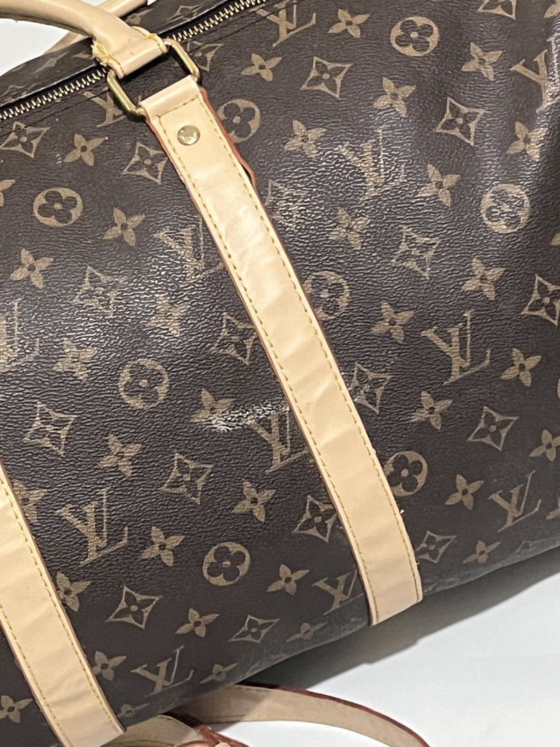 Louis Vuitton Monogram Keepall 55 (Category: Luxury Bags & Wallets) located in Pilar. Submitted by fast-flip-ni-miko. (Listing ID 1459126012, Image 3). Description: - Authentic Louis Vuitton Keepall 55 - Classic Monogram Canvas - Vachetta Leather Trim - Gold-tone Hardware - Detachable Shoulder Strap Included - Ideal for Travel & Weekend Getaways - Zippers function smoothly.