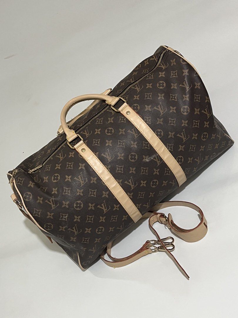 Louis Vuitton Monogram Keepall 55 (Category: Luxury Bags & Wallets) located in Pilar. Submitted by fast-flip-ni-miko. (Listing ID 1459126012, Image 2). Description: - Authentic Louis Vuitton Keepall 55 - Classic Monogram Canvas - Vachetta Leather Trim - Gold-tone Hardware - Detachable Shoulder Strap Included - Ideal for Travel & Weekend Getaways - Zippers function smoothly.