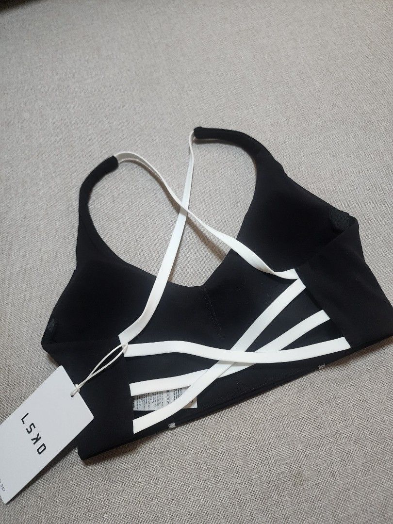 LSKD Stellar Sports Bra (Category: Activewear) located in Manila. Submitted by mcbuy_sell (Listing ID 1459204200, Image 2). Description: LSKD Stellar Sports Bra Super nice!😍 - Color: Black with white contrast piping - Design: Criss-cross strap detail at the back - Condition: Brand new with original tags attached Size S SRP: 3500 Selling for only 3000 😍.