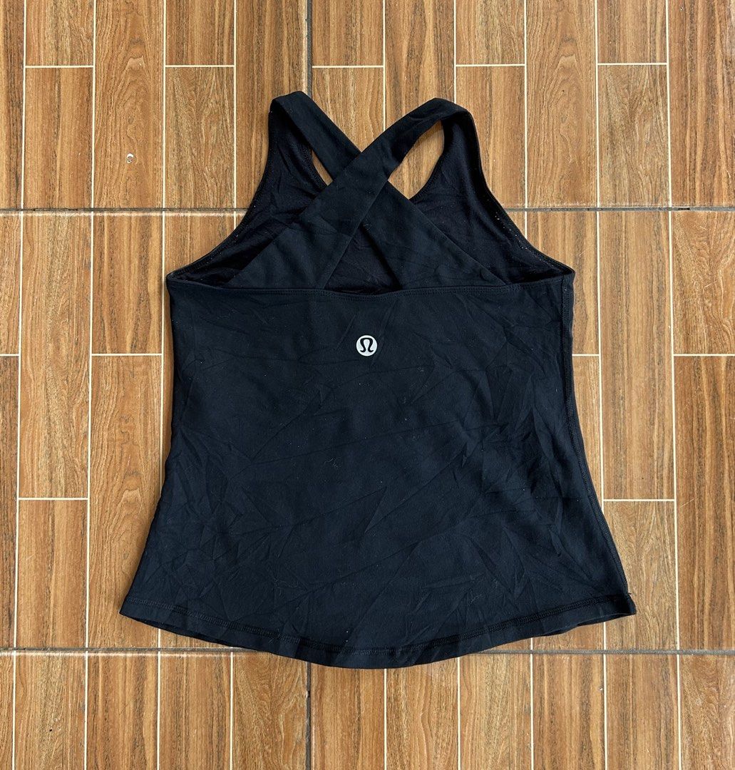 Lululemon Black Criss-Cross Back Tank Top (Category: Activewear) located in Cagayan de Oro. Submitted by aljay02 (Listing ID 1459210849, Image 2). Description: - Lululemon black tank top - Features stylish criss-cross straps at the back - Ideal for workouts or casual wear - Made from soft and comfortable material - Measurements: Approximately 13 inches across the chest and 20 inches in length.