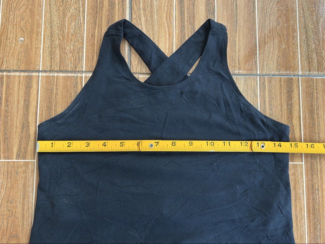 Lululemon Black Criss-Cross Back Tank Top (Category: Activewear) located in Cagayan de Oro. Submitted by aljay02 (Listing ID 1459210849, Image 3). Description: - Lululemon black tank top - Features stylish criss-cross straps at the back - Ideal for workouts or casual wear - Made from soft and comfortable material - Measurements: Approximately 13 inches across the chest and 20 inches in length.