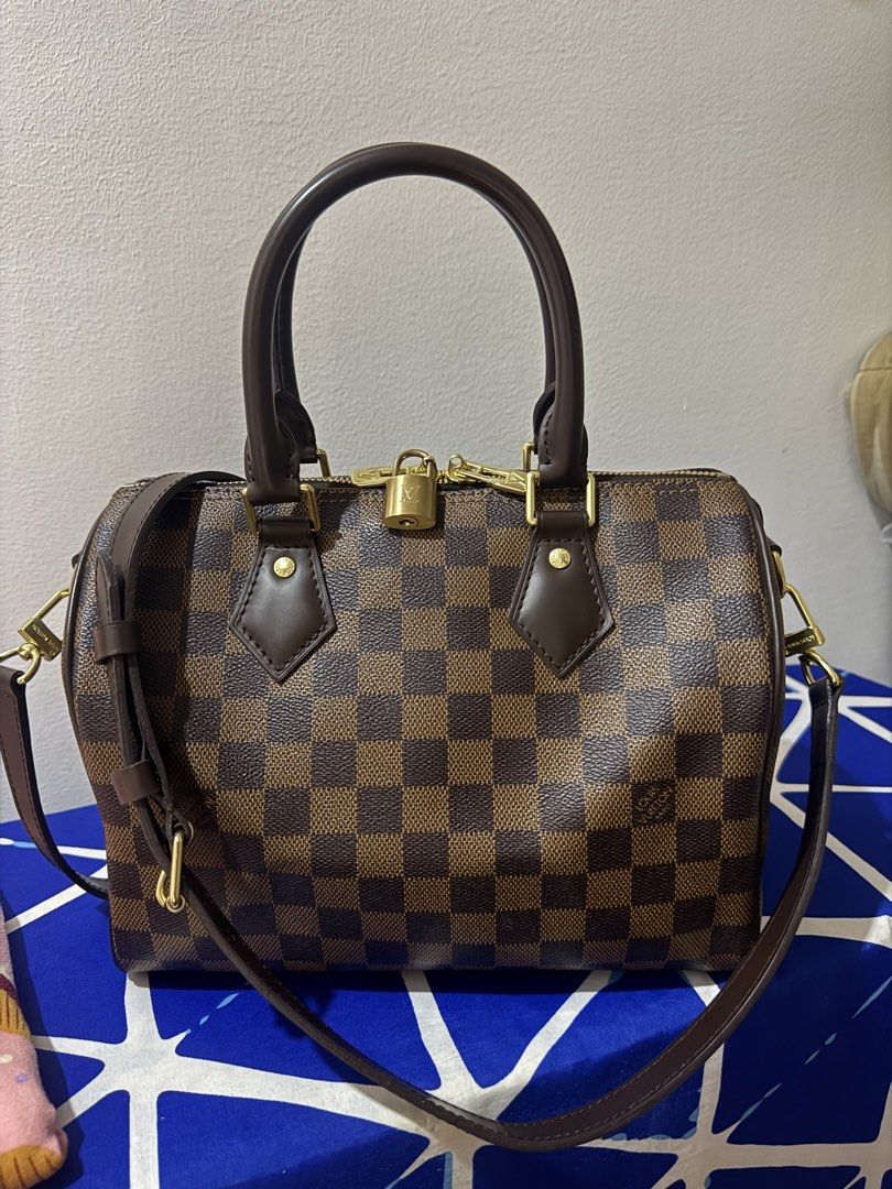 lv bandouliere 25 ebene (Category: Cross-body Bags) located in Las Pinas. Submitted by 2021privateshopper (Listing ID 1459133801, Image 1). Description: lv bandouliere size 25 ebene Actual pictures posted Complete with sling , cards, lock & keys And dustbag Flaw: see last pic (sold as is) .