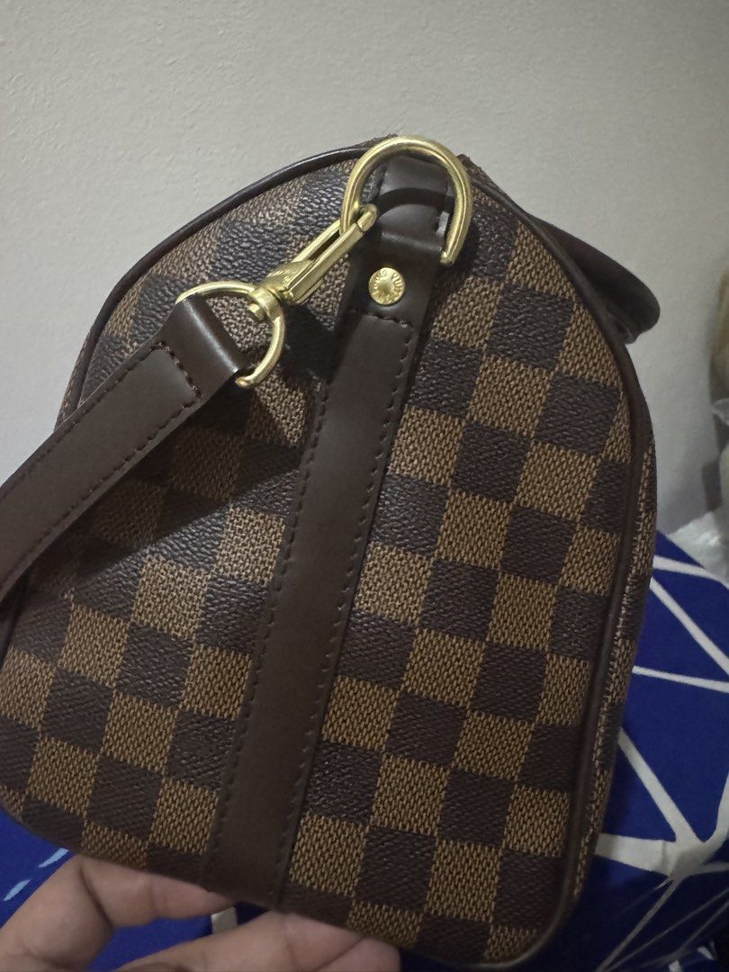 lv bandouliere 25 ebene (Category: Cross-body Bags) located in Las Pinas. Submitted by 2021privateshopper (Listing ID 1459133801, Image 3). Description: lv bandouliere size 25 ebene Actual pictures posted Complete with sling , cards, lock & keys And dustbag Flaw: see last pic (sold as is) .