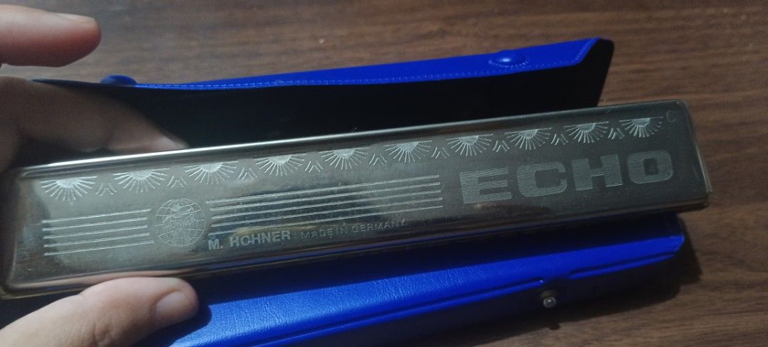 M. Hohner Echo No. 2509 Harmonica Made in Germany (Category: Musical Instruments) located in Batangas. Submitted by baning_finds (Listing ID 1459185719, Image 3). Description: - Vintage M. Hohner Echo Harmonica - Model No. 2509 - Made in Germany - Comes with original blue case - Shows some signs of use, but in good working order - Ideal for collectors and musicians - Perfect for blues or folk music.