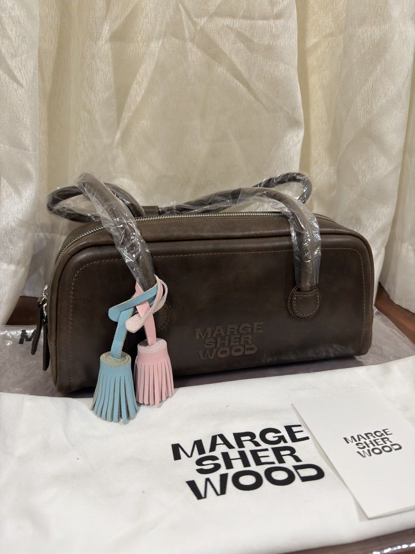 MARGE SHERWOOD Soft Boston EW (Category: Luxury Bags & Wallets) located in Cebu City. Submitted by huff.puff (Listing ID 1459185997, Image 3). Description: - Authentic from Korea 💯 - Brand new ✨ - Comes complete with original dust bag and authenticity and care card - Color: Washed brown pull-up - Retails for Php 23k ✨ Last 4 photos ctto for reference only 🤍 ✨ charms not for sale.