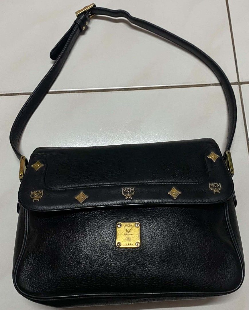 MCM Black Leather Shoulder Bag with Gold Hardware (Category: Luxury Bags & Wallets) located in Manila. Submitted by gutierrez23265 (Listing ID 1459155770, Image 1). Description: - Authentic MCM germany black leather shoulder bag - Features iconic MCM logo - Elegant gold-tone hardware - Adjustable buckle strap for comfort - Interior branded plaque - Stylish and practical for everyday use PLS CHECK ALL PHOTOS DETAILS before magmine NO RETURN NO EXC