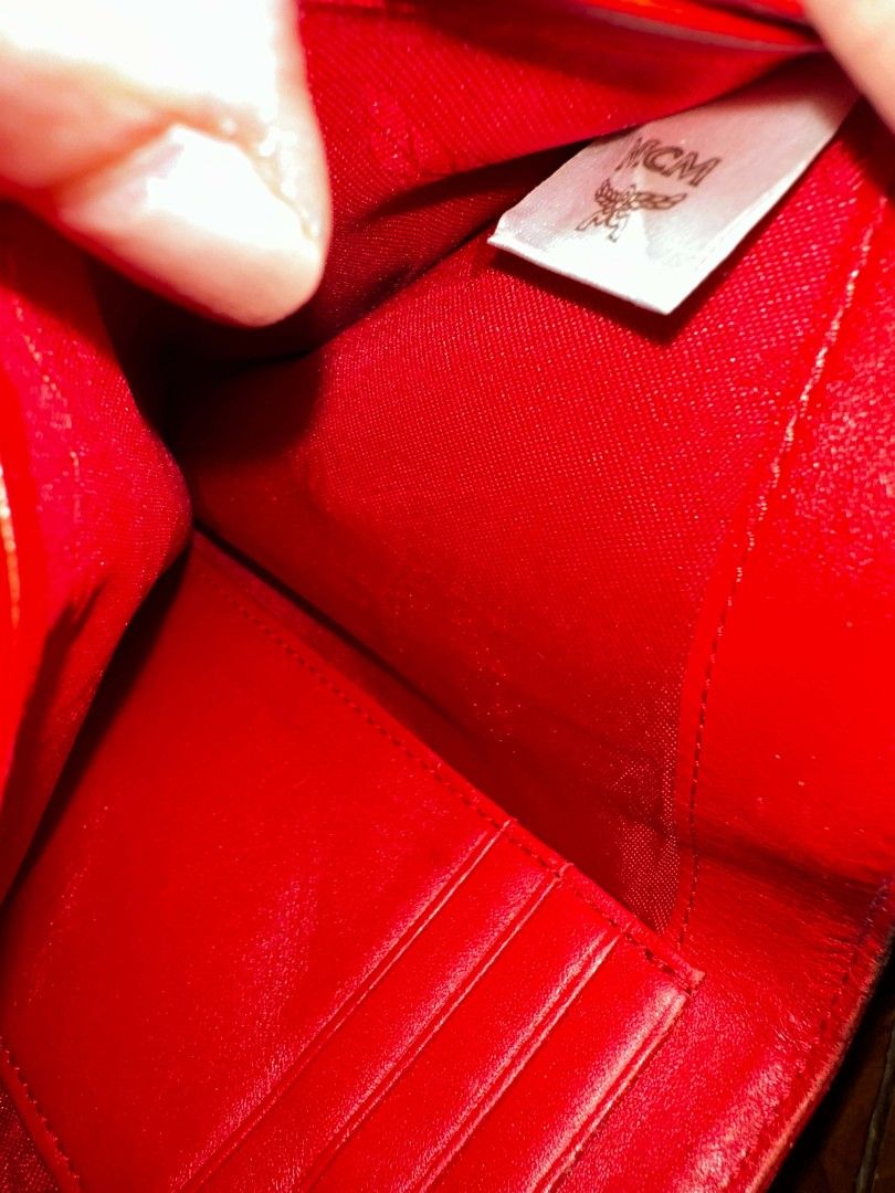 Mcm red wallet (Category: Wallets & Card holders) located in Angeles City. Submitted by aiscanday (Listing ID 1459115480, Image 2). Description: declutter.