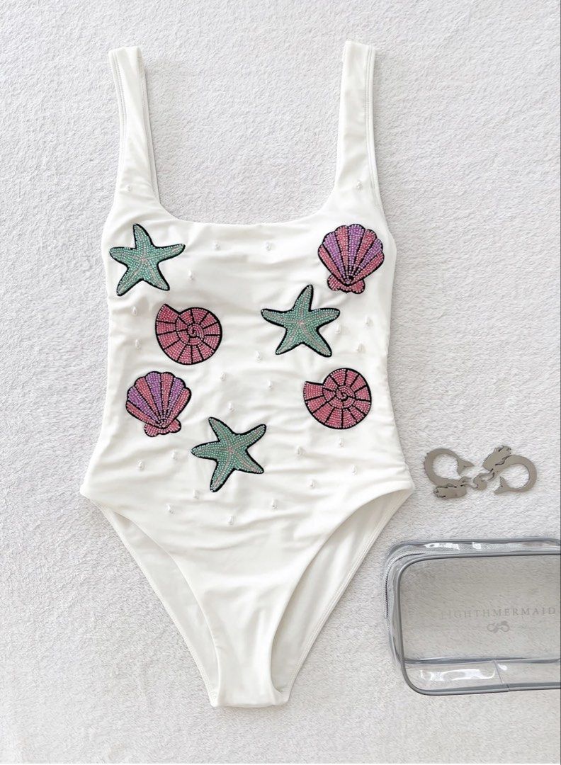 Medium - Eighth Mermaid | EighthMermaid Camilla Full Piece White in Shell (Category: Bikinis & Swimsuits) located in Caloocan City. Submitted by threegirlscloset2 (Listing ID 1459207678, Image 1). Description: Size: Medium We bought this before sale, can provide receipt Negotiable .