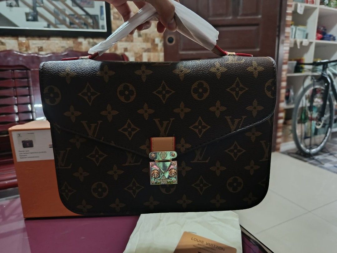 Medium-sized Hand and Sling Bag (Category: Cross-body Bags) located in Manila. Submitted by viandrei.ph (Listing ID 1459098039, Image 3). Description: This product includes: - Brand New Item (never used just got stocked at home) - Box - Dustbag, Care Card, Tag - Adjustable Leather Strap for Sling or Cross-body *ISSUE: Leather edges of the bag are quite sticky (but can be wiped with leather oil).