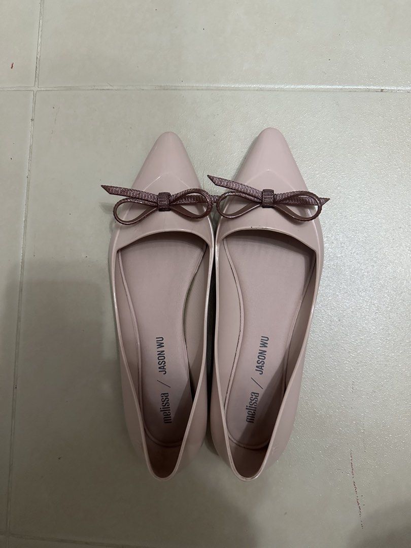 Melissa x Jason Wu Pink Bow Pointed Toe Flats (Category: Flats & Sandals) located in Makati City. Submitted by kristine_p_a (Listing ID 1459210237, Image 1). Description: - Melissa x Jason Wu collaboration flats - Soft pink color - Cute ribbon detail on pointed toe - Easy slip-on style - Size US7 - Made in Brazil.