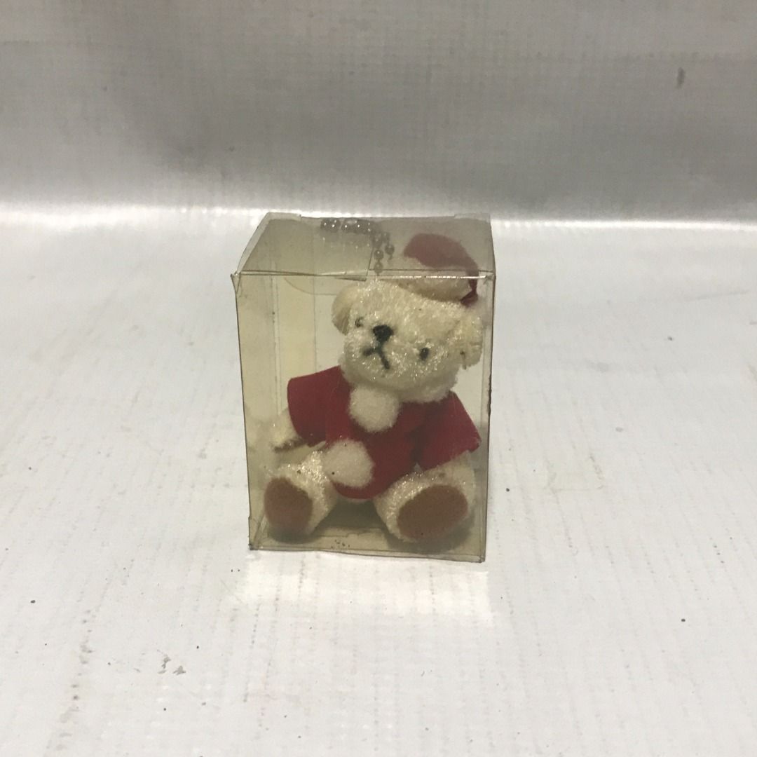 Mini Santa Teddy Bear in Clear Box Keychain #4965 (Category: Plushies & Soft Toys) located in Malabon City. Submitted by mldg.surplus (Listing ID 1459180817, Image 1). Description: MLDG Surplus Reminder: •Expect minimal flaws such as stain, lint, scratches etc. •No reservation, we can accept your offer, but it doesn't mean that the item is reserved. •No other picture. All pictures are posted already. •Battery operated items does not included batt