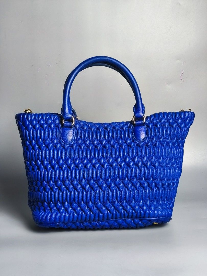 Miu Miu Matelasse Quilted Handbag (Category: Luxury Bags & Wallets) located in Bulacan. Submitted by 4kcollection.ph (Listing ID 1459267964, Image 2). Description: Miu Miu Matelasse Quilted Handbag Pre-loved from Japan Good Condition Size: Small to Medium H'9 x L'13.5 x W'6 Inch W/ 1 Strap Normal sign of Usage May dark spot sa body hndi nman halata May part na repaint na Dm for sure buyer 📩 MOP: Gcash / Maya / BPI Courier: J&t / Lbc / Lalamove L