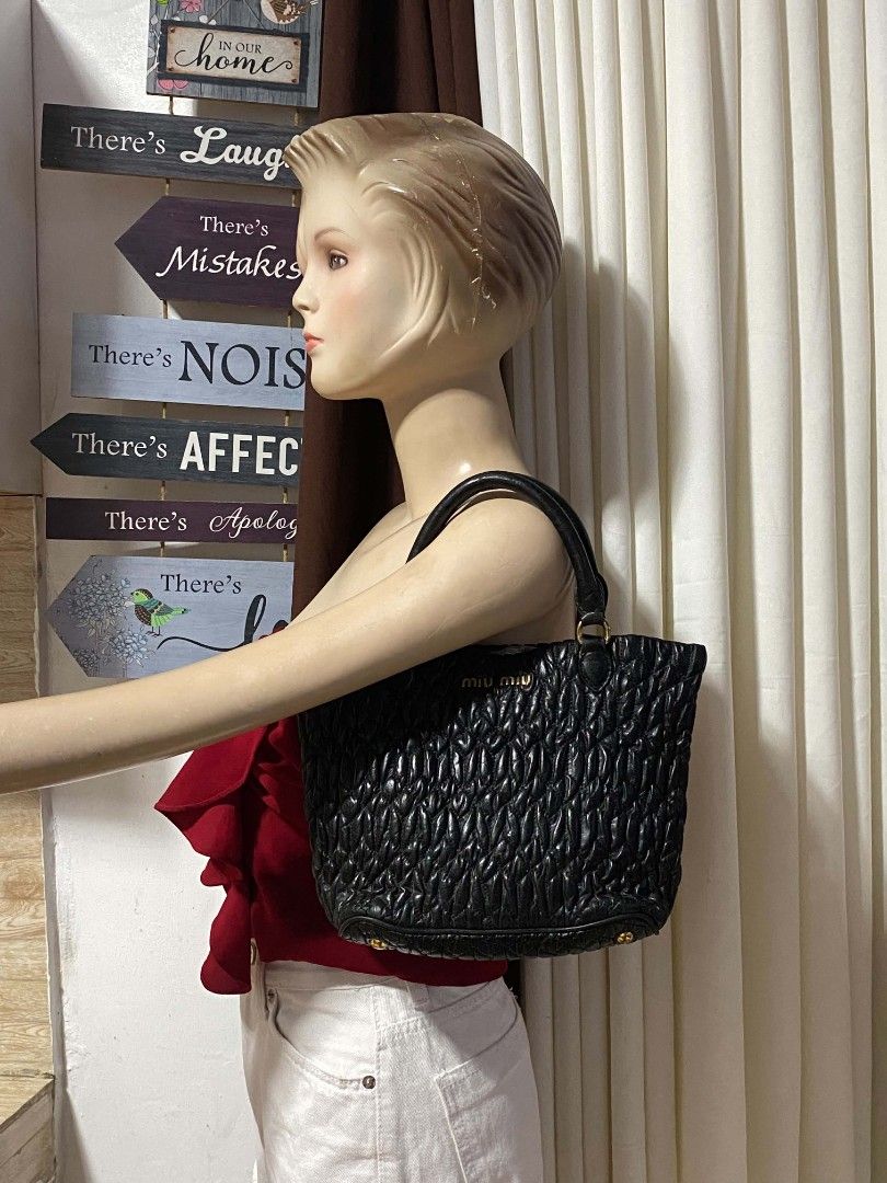 Miumiu (Category: Luxury Bags & Wallets) located in Tagum. Submitted by janmarion049706 (Listing ID 1459092530, Image 3). Description: good condition sign of use only missing sling super tibay genuine leathe.