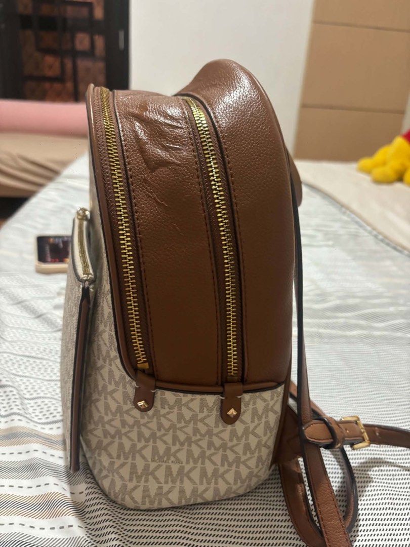 Michael Kors Adina Medium Logo Backpack (Authentic) (Category: Luxury Bags & Wallets) located in Pasig City. Submitted by declutteringmom2 (Listing ID 1459279846, Image 3). Description: ‼️Check this first: https://carousell.app.link/RjrsQnRb65b 🔹💯 Authentic 🔹Bought directly from MK Store Japan🇯🇵 🔹No other inclusion 🔹Actual Photos Posted 🔹 Visible signs of usage and has flaws in bottom part of strap ad the bag. 🔹Feel free to haggle. But n