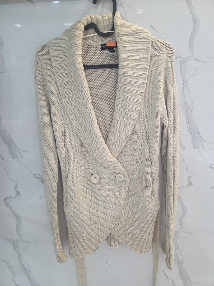 MNG Beige Knit Cardigan with Buttons (Category: Coats, Jackets and Outerwear) located in San Juan City. Submitted by rwongthings (Listing ID 1459133603, Image 1). Description: Mango Beige knit cardigan Dry Cleaned Wrap style with two button closures - Features cable knit details on sleeves and collar - Includes a tie belt for versatile styling - Ideal for layering over outfits.