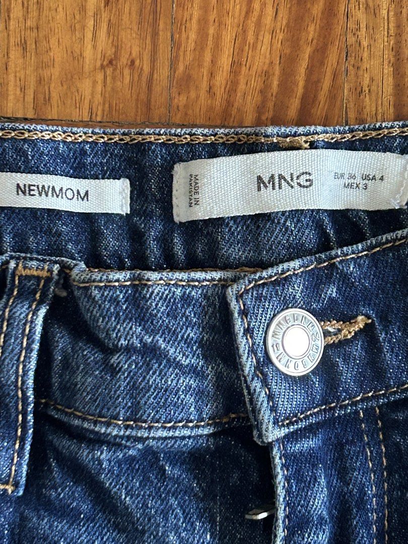 MNG NEW MOM Jeans - Blue Denim (Category: Jeans) located in Makati City. Submitted by kt1030 (Listing ID 1459160232, Image 3). Description: - Brand: MNG - Style: 'New Mom' Jeans - Fit: High waist, straight leg - Closure: Button fly - Origin: Made in Pakistan - Color: Classic Blue Denim - Versatile staple piece for any wardrobe.