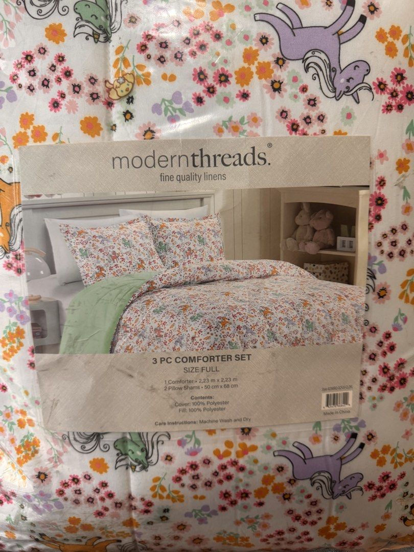 Modern Threads Full Size 3 PC Comforter Set Unicorn Floral (Category: Bedding & Towels) located in Marikina City. Submitted by marissmhc08 (Listing ID 1459218613, Image 1). Description: - Modern Threads 3-piece comforter set - Adorable unicorn and floral print - Set includes: 1 comforter, 2 pillow shams - Comforter fill: 100% polyester - Easy care: Machine wash and dry - Ideal for a child's bedroom.