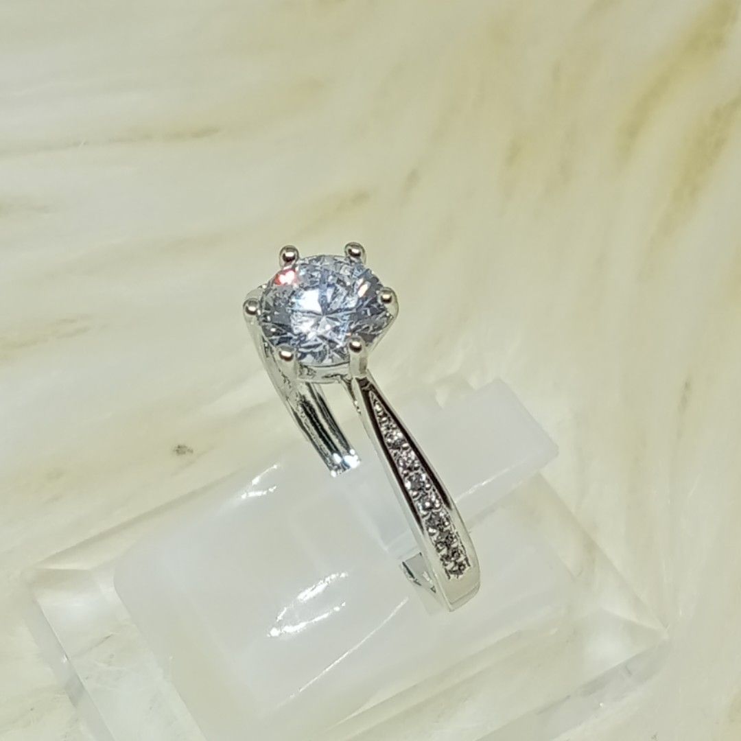 Moissanite Ring ✨ 18K goldplated ✨ PT950 marking (Category: Rings) located in Ozamiz City. Submitted by leovelle. (Listing ID 1459211206, Image 3). Description: Moissanite Ring ✨ 18K goldplated ✨ PT950 marking.