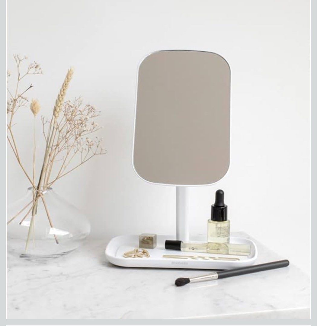Mumuso Desktop Mirror (Category: Mirrors) located in Quezon City. Submitted by declutter_with_ericka (Listing ID 1459096822, Image 1). Description: White Desktop Mirror with Tray Brand: Mumuso Comes with Mumuso box 10pcs available Specifications: 20 × 28.3 cms Product Features: Includes a storage base beneath the mirror to save space and keep your items organized. Assembly Instructions: Insert the bottom part of the handle into the base slot and 