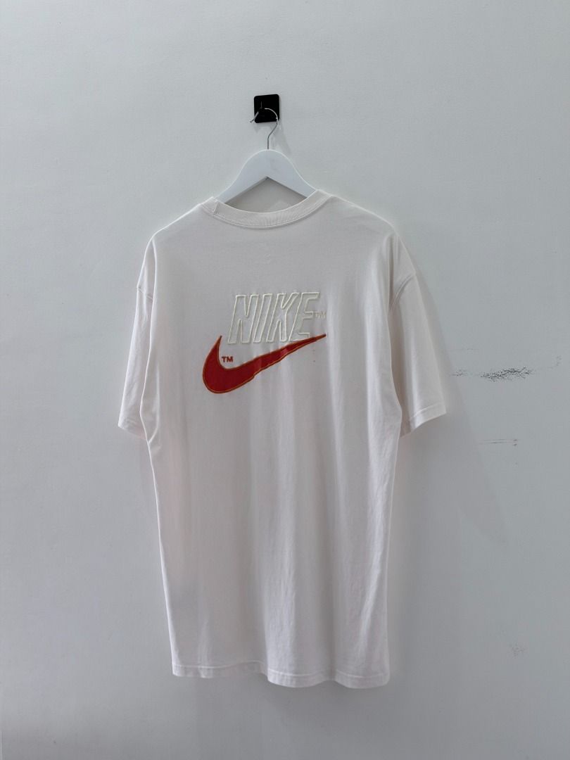 NIKE LOOSE FIT tee shirt (Category: Tshirts & Polo Shirts ) located in Cabanatuan. Submitted by argarments.ph (Listing ID 1459117852, Image 3). Description: Tagged: XXL on tag Width 22" | Length 31.5" Condition: Good Issue(s): Slightly bleeding & small hole. see photos.