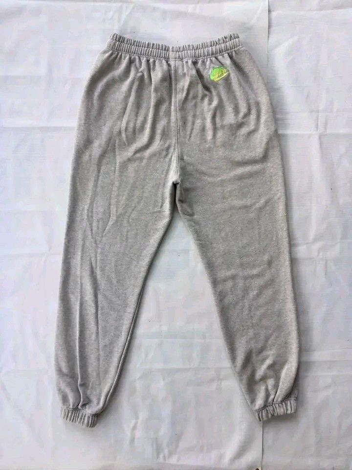 Nike Multi-Colored Swoosh Grey Sweatpants Joggers (Large) (Category: Joggers) located in Caloocan City. Submitted by babradede215 (Listing ID 1459203245, Image 2). Description: Waistline : 28 to 30 Length : 38 Hem : 5 to 7 Color Rate : 9.8/10.