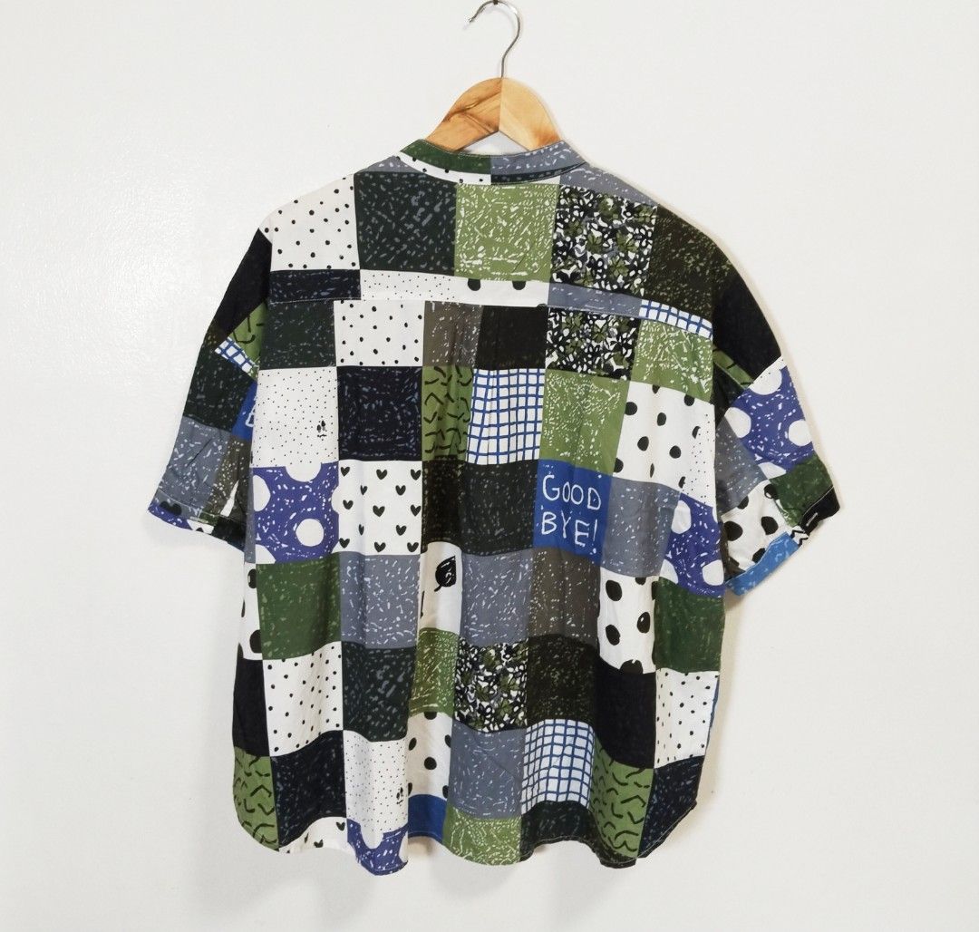 Niko and Patchwork Button-Up Shirt with Collar (Category: Blouses) located in Pateros City. Submitted by blashjunks.y2k (Listing ID 1459188314, Image 3). Description: - Unique patchwork print shirt - Features a stylish mandarin collar - Comfortable short sleeves - Convenient chest pocket - Ideal for a casual, artsy aesthetic - Effortless to style for any occasion.