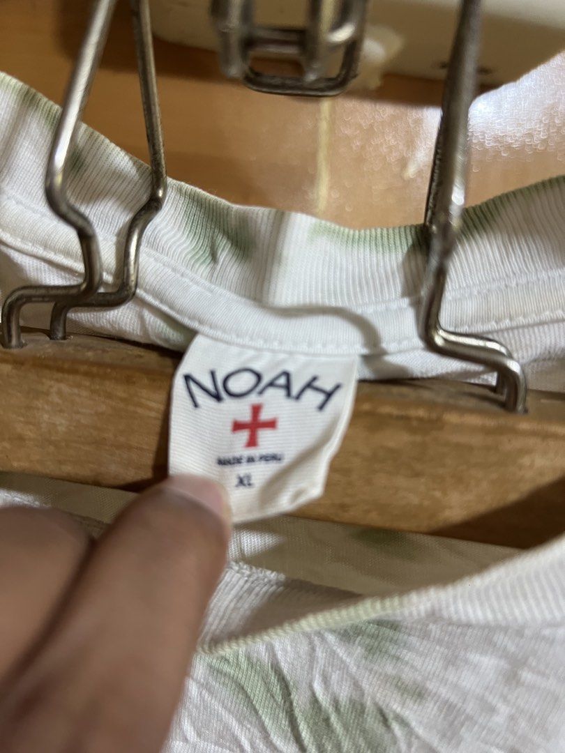 NOAH Tie-Dye Pocket T-Shirt (Category: Tshirts & Polo Shirts ) located in Valencia. Submitted by thrifttomaniac_1225 (Listing ID 1459141457, Image 3). Description: - NOAH Tie-Dye T-Shirt - Color: White and Green - Size: XL - Features: Chest pocket with NOAH logo - Origin: Made in Peru.