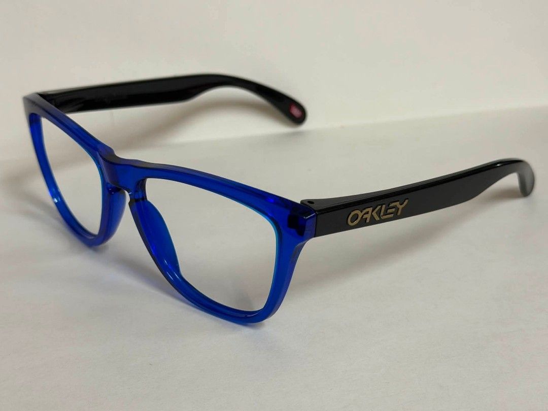 Oakley Frogskins Eyeglasses Blue Frame (Category: Sunglasses & Eyewear) located in Iloilo. Submitted by grail.dibs (Listing ID 1459100750, Image 1). Description: - Brand: Oakley - Model: Frogskins - Frame Color: Blue with black - Unit only, no pouch/case/box, no demo lens +SF.