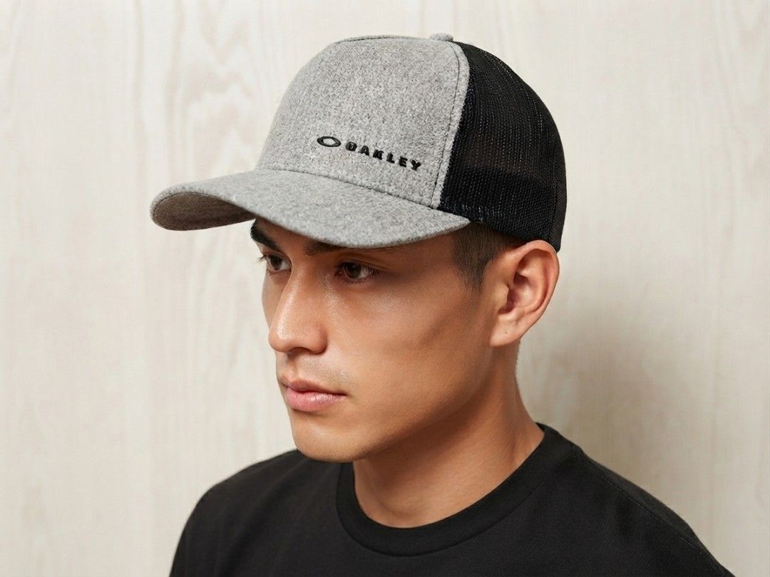 Oakley Grey Trucker Cap (Category: Caps & Hats) located in Panabo. Submitted by assrtdph (Listing ID 1459190761, Image 1). Description: -Authentic -Grey and black combination trucker cap.. -Metal logo -Excellent condition, minimal sign of usage.