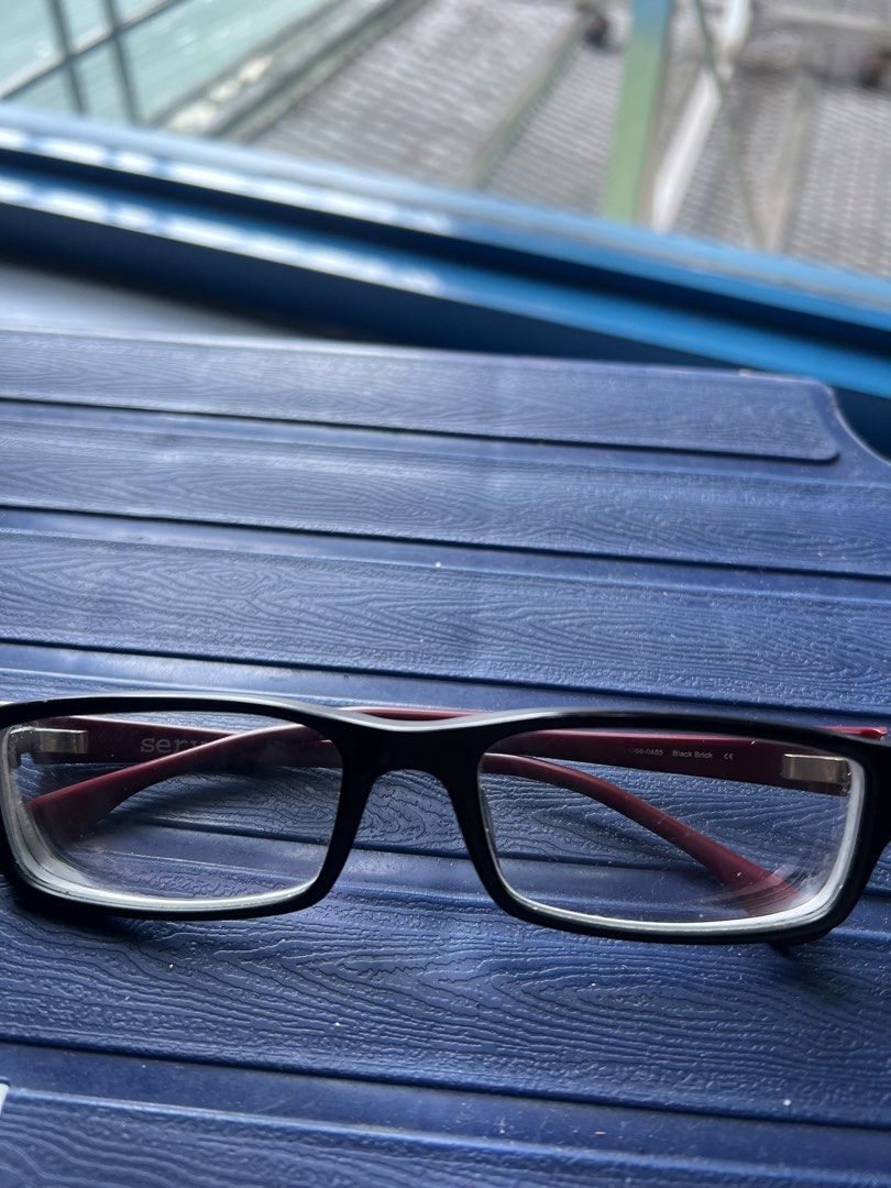 Oakley Servo Black & Red Eyeglasses Frame (Category: Sunglasses & Eyewear) located in San Juan City. Submitted by iambernie (Listing ID 1459139972, Image 3). Description: - Brand: Oakley Eyeglasses - Frame Color: Black - Arm Color: Red - Frame Shape: Rectangular - Lenses: have prescription in them, you need to remove and replace the lens - Ideal for: Everyday wear - Condition: Good - Cost of Oakley frame around 10k and up .