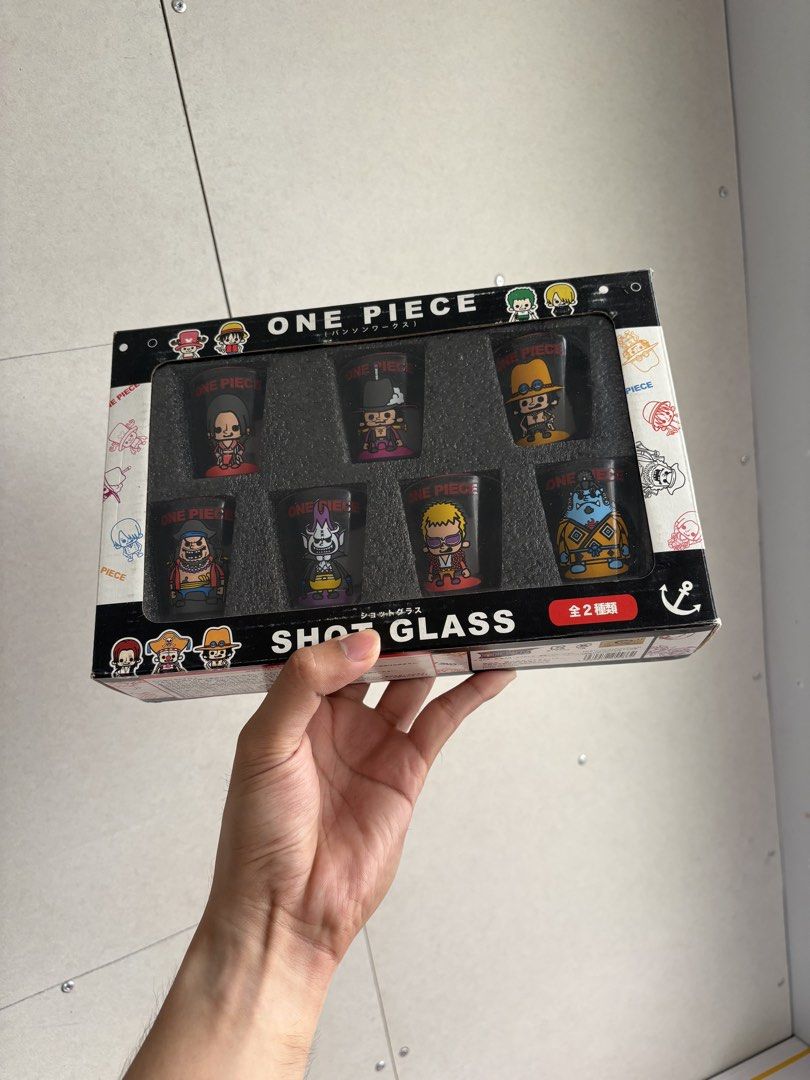 One Piece Shot Glass Set - Panson Works (Category: Dinnerware & Cutlery) located in Manila. Submitted by tj.merch (Listing ID 1459098093, Image 1). Description: - Set of 6 One Piece shot glasses - Features characters designed by Panson Works - Comes in a collectible gift box - Ideal for One Piece fans and collectors - Great for display or everyday use.