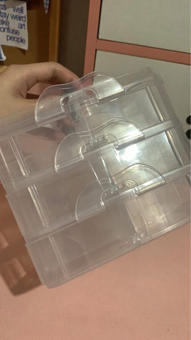 (Organizer) Clear Stackable Storage Box with Handle (Category: Storage Boxes & Baskets) located in Mexico. Submitted by wisestone.03b206 (Listing ID 1459137190, Image 2). Description: - Clear plastic storage box - Features three stackable compartments - Built-in handle for easy carrying - Ideal for organizing small items - Keeps your space tidy and items accessible - Suitable for desk or shelf organization.