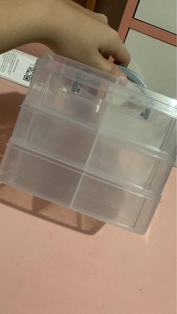 (Organizer) Clear Stackable Storage Box with Handle (Category: Storage Boxes & Baskets) located in Mexico. Submitted by wisestone.03b206 (Listing ID 1459137190, Image 3). Description: - Clear plastic storage box - Features three stackable compartments - Built-in handle for easy carrying - Ideal for organizing small items - Keeps your space tidy and items accessible - Suitable for desk or shelf organization.