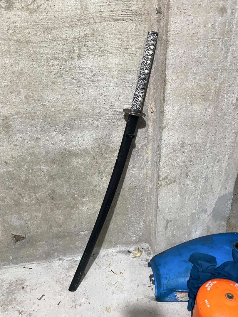 Original Katana Sword with Scabbard From Japan (Category: Vintage Collectibles) located in Antipolo. Submitted by katsuren (Listing ID 1459134349, Image 2). Description: Bocaue, Bulacan Locatiin - Authentic-looking katana sword - Includes a sleek black scabbard - Handle features a detailed patterned grip - Ideal for display or adding to your collection - Feel free to ask any questions!.
