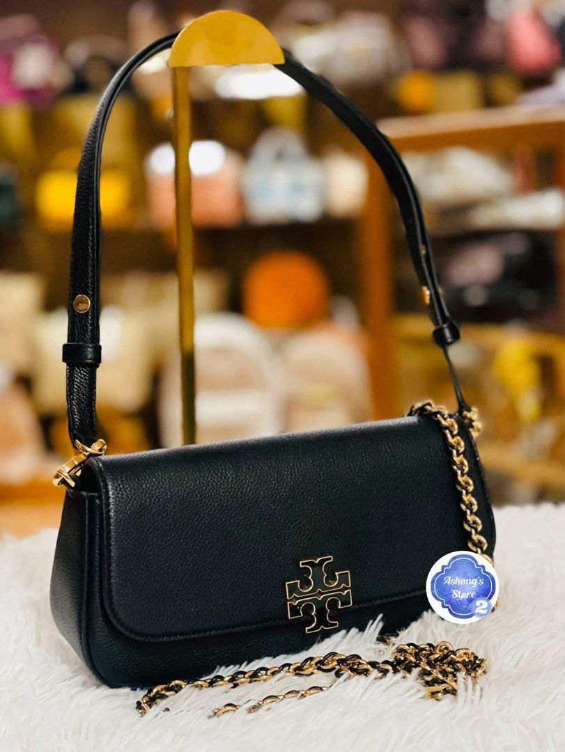 💯ORIGINAL TORY BURCH BRITTEN CONVERTIBLE SHOULDER BAG NEW VERSION (Category: Shoulder Bags) located in Quezon City. Submitted by ashongsstore (Listing ID 1459092773, Image 1). Description: ✨ T0RY BURCH BRITTEN CONVERTIBLE SHOULDER BAG ✨ NEW VERSION 🇵🇭AVAILABLE🇵🇭 Timeless, polished, and effortlessly chic. 🖤 The Britten Convertible Shoulder Bag is the perfect everyday bag for those who love understated luxury. 🤍 Convertible design — wear it 