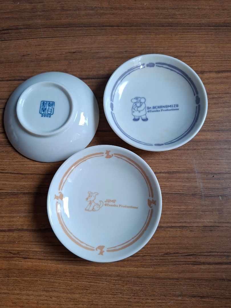 Osamo Tezuka's Astro Boy Small Plates (Category: Other Kitchenware & Tableware) located in Consolacion. Submitted by luxekerei (Listing ID 1459190489, Image 2). Description: - ceramic small plates (shōzara) featuring characters from Osamu Tezuka's Astro Boy (Tetsuwan Atomu) series, which were released as promotional novelty items by the Asahi Shimbun around 2002–2003.