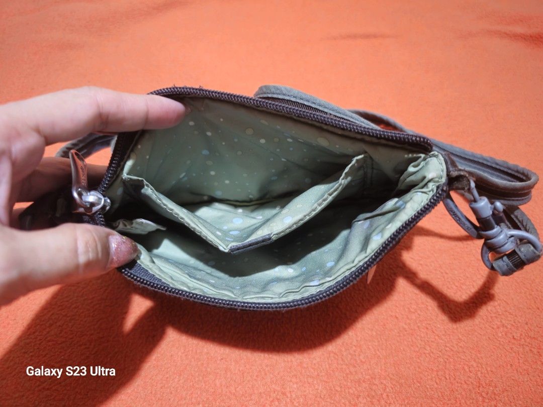 Pacsafe Citisafe CS 25 Crossbody Bag (Category: Sling Bags) located in Quezon City. Submitted by bagsforless16 (Listing ID 1459127882, Image 3). Description: Mini Phone Sling Black Color Anti-Theft Features for Security Multiple Compartments for Organization Small but can fit 2 Phones Front Zip for Essentials Items Adjustable Anti Theft Strap for Comfortable Wear Size: 8" x 5".