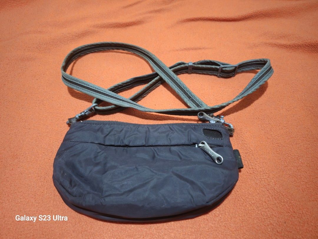 Pacsafe Citisafe CS 25 Crossbody Bag (Category: Sling Bags) located in Quezon City. Submitted by bagsforless16 (Listing ID 1459127882, Image 2). Description: Mini Phone Sling Black Color Anti-Theft Features for Security Multiple Compartments for Organization Small but can fit 2 Phones Front Zip for Essentials Items Adjustable Anti Theft Strap for Comfortable Wear Size: 8" x 5".